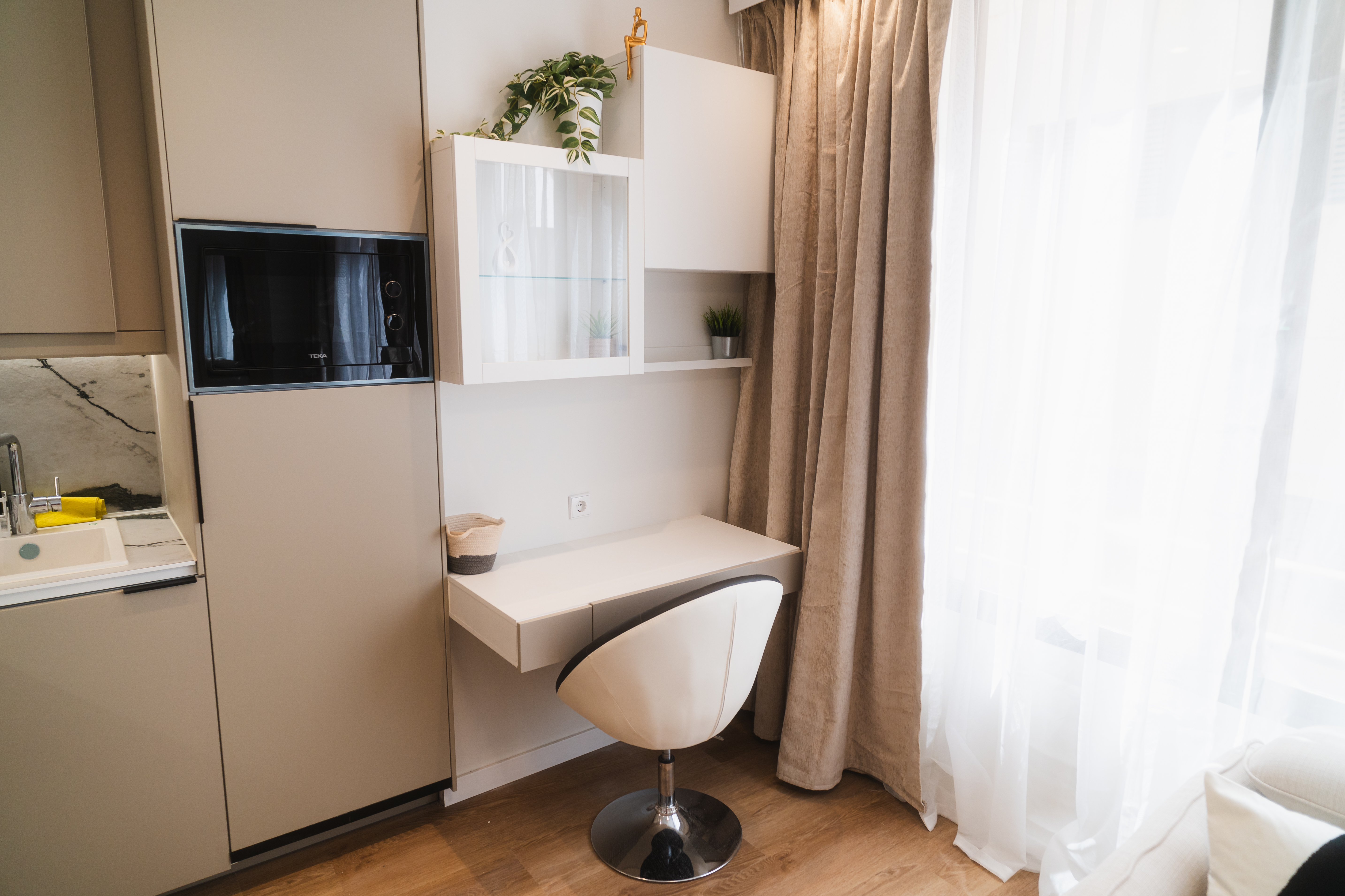 Elegant wooden accents and soft lighting in White Studio